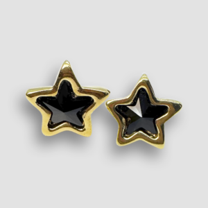 Gold plated star with black stone